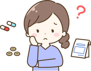 薬について悩んでいる女性